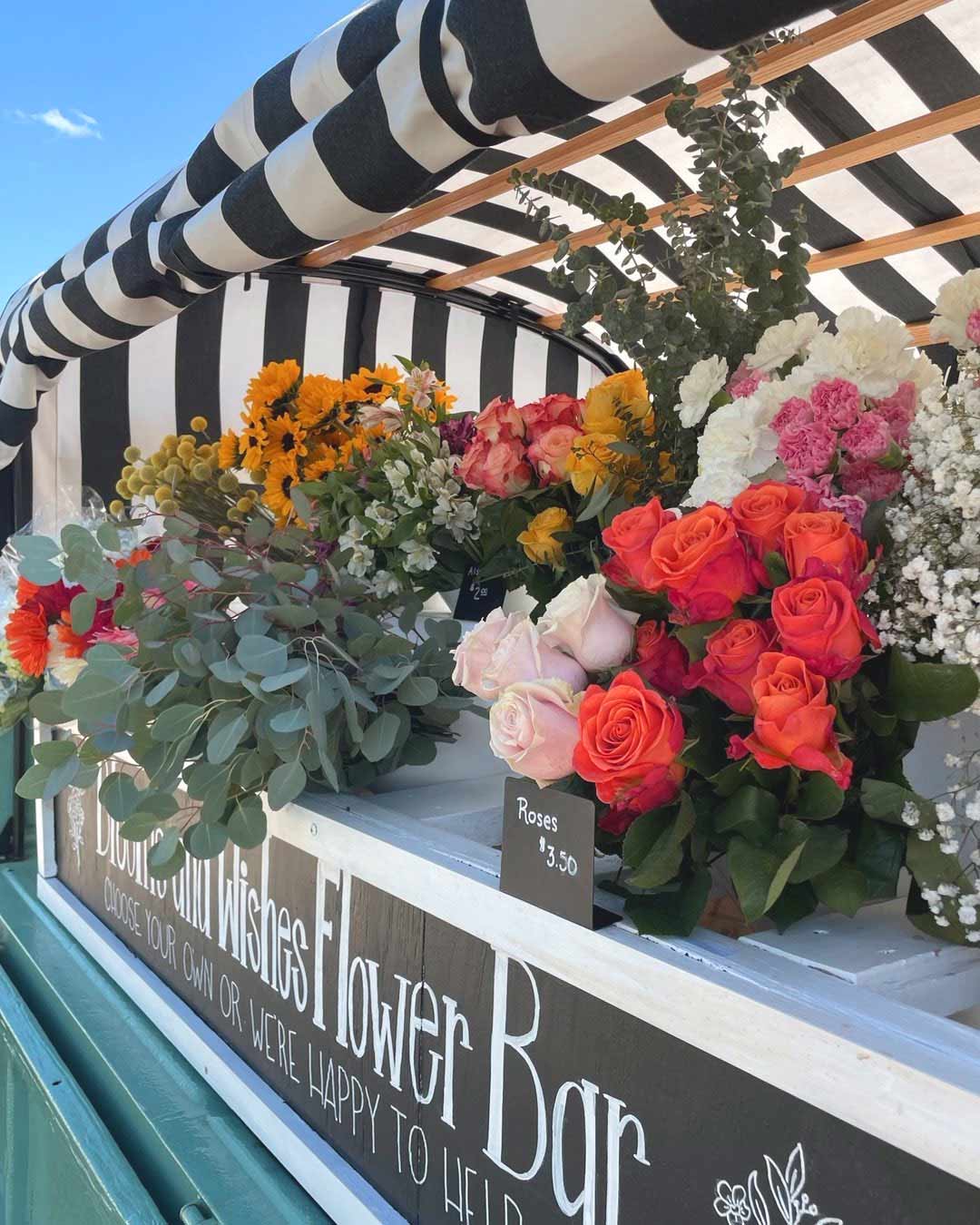 Stem-bar Truck with Flowers: Sunflowers and Roses on a Summer Day in Columbia, MO